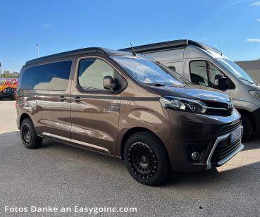 Twin Monotube AT1 8x17 ET33 Felge für Opel Zafira Life mit Anfahrschutzring schwarz HA