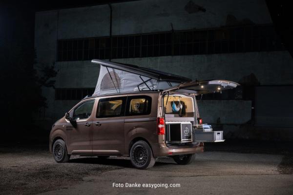 Twin Monotube AT1 8x17 ET33 Felge für Opel Zafira Life mit Anfahrschutzring schwarz HA